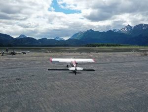 airplane landing on beach