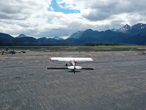 airplane landing on beach
